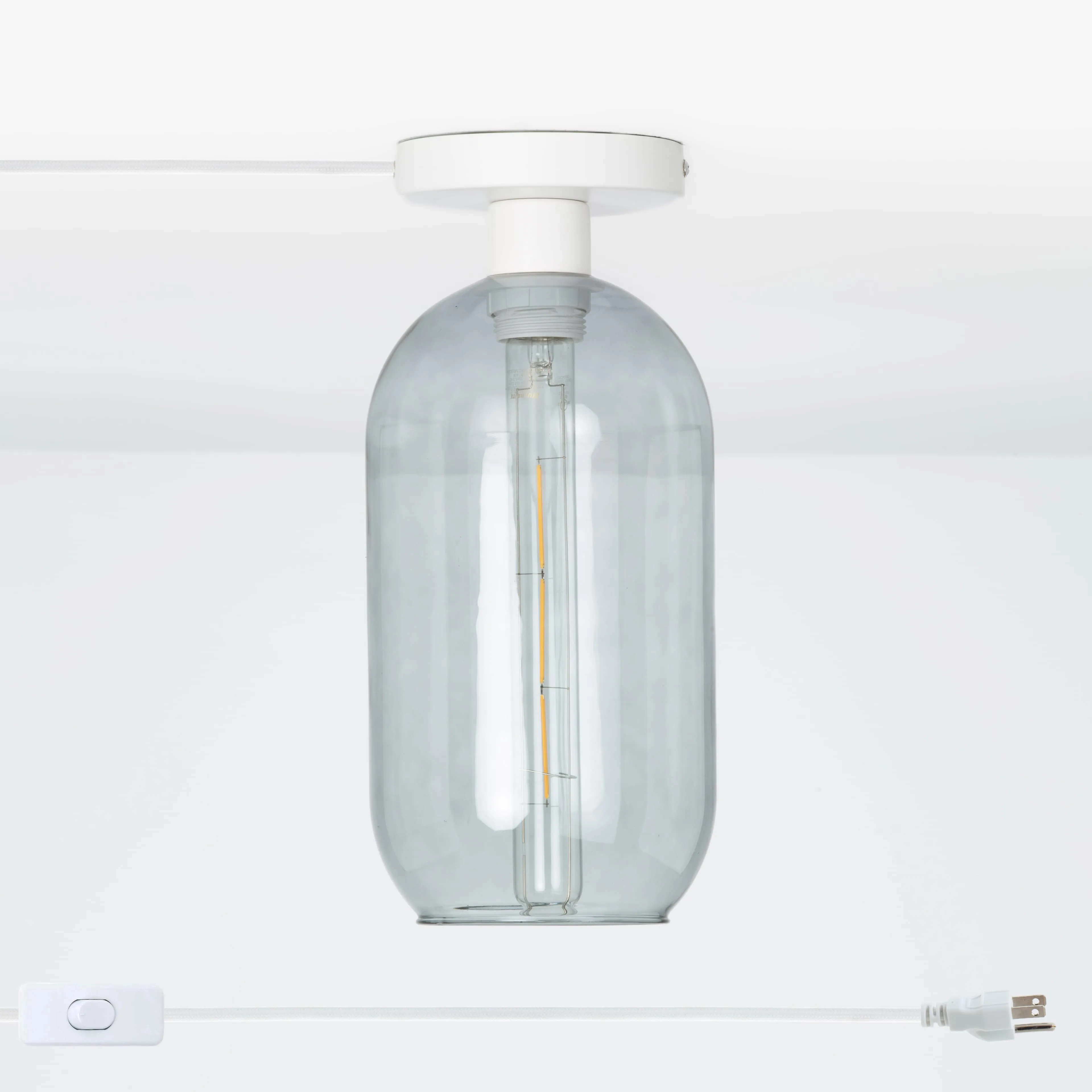 Plug-In Glass Pill Button Light